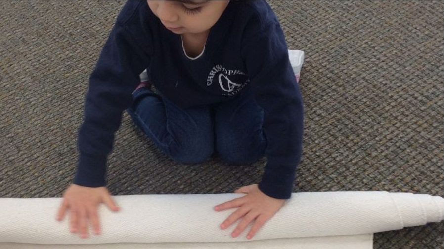 Montessori Monday Rolling A Rug